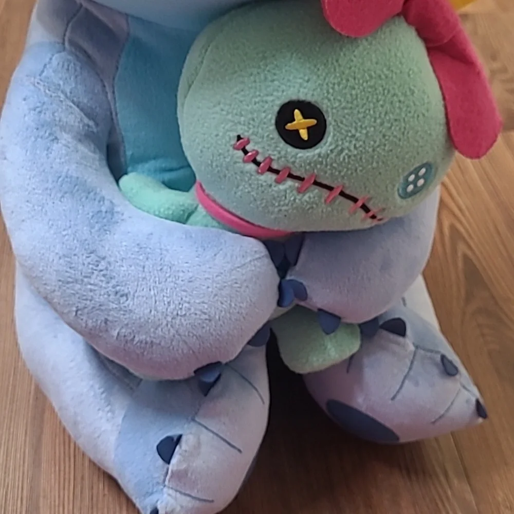 Disney Blue and‎ Pink Stitch Plush with Green Doll used good condition.